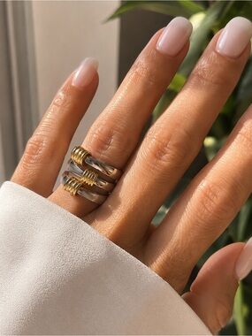 Anthropologie Two-Tone Knot Stack Rings in Gold and Silver